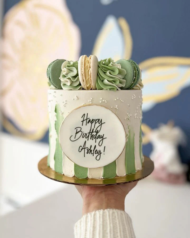 Birthday cake in hue's of green ! Eggless vanilla & butterscotch cake  adorned with some bunny tails and edible gold lace ! | Instagram