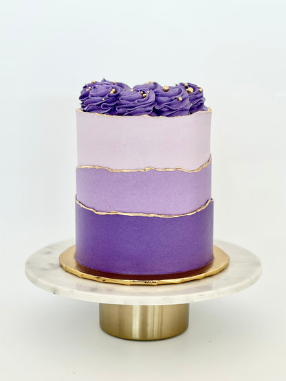 Textured Ombre With Gold Edges and Swirls On Top Cake