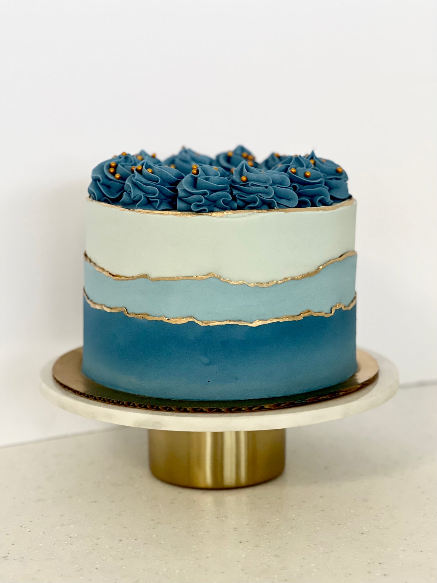 Textured Ombre With Gold Edges and Swirls On Top Cake